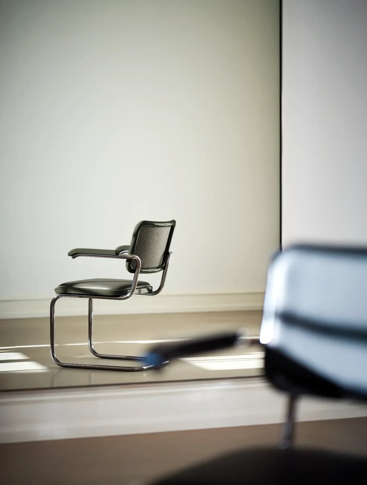 Editorial JS . Thonet cantilever chair S64 of the SERIOUS 03 edition in graphite green.