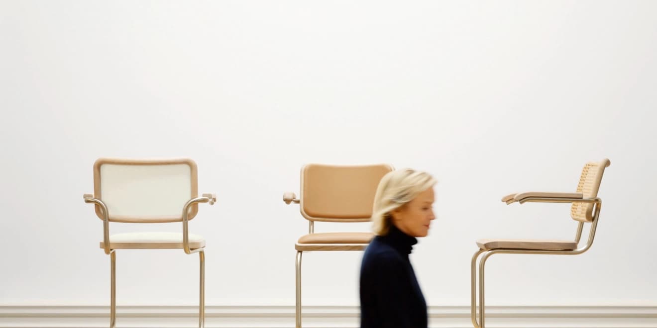 Press photo of Jil Sander with Thonet S64 cantilever chairs in the NORDIC and SERIOUS editions in the background.